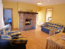 open fireplace in lounge of Lough Salt Cottage