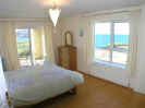 Killahoey View Apartment - Portnablagh - double bedroom with balcony and sea views
