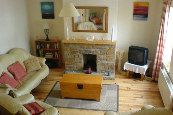 living room with open fireplace