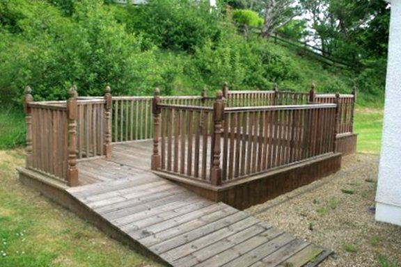 Wood deck to rear of property