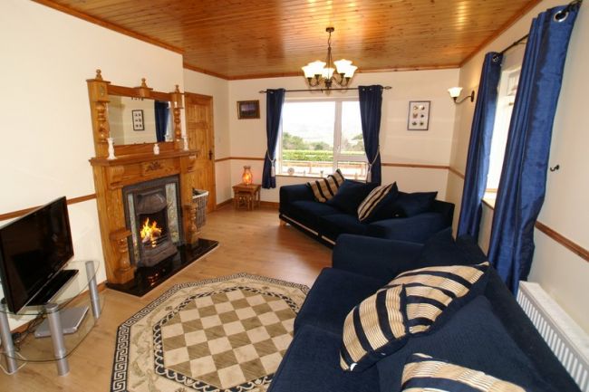 The Living Room has an open fireplace