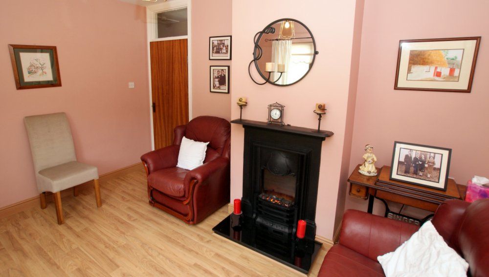 The living room has an electric effect fire
