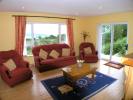 spacious lounge of tranquility heights holiday cottage